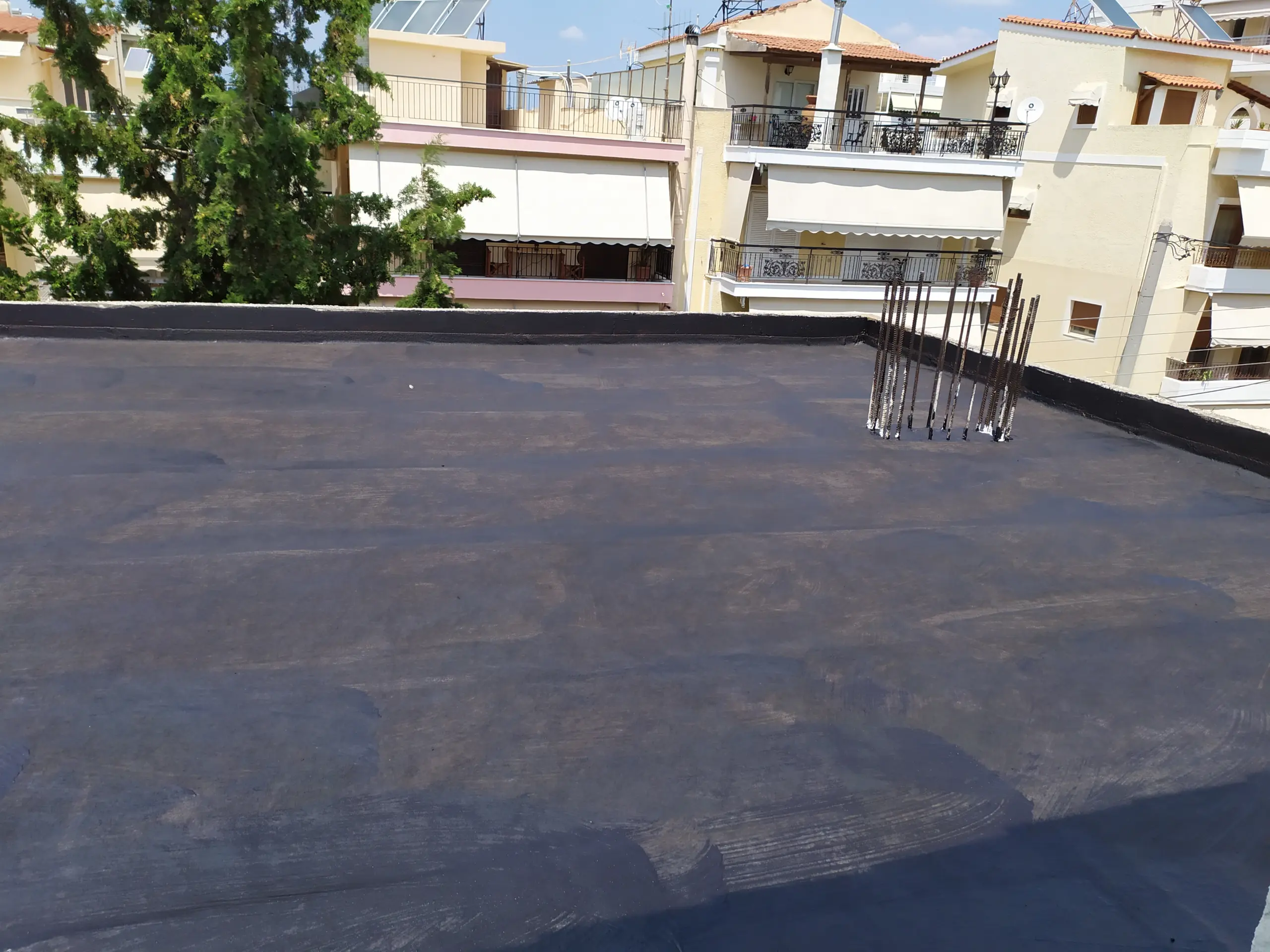 σφράγιση μόνωσης με ασφαλτικά